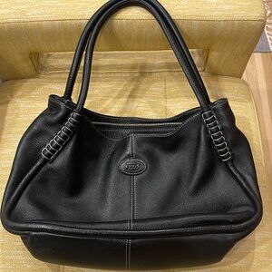 Tod’s black purse with white stitching